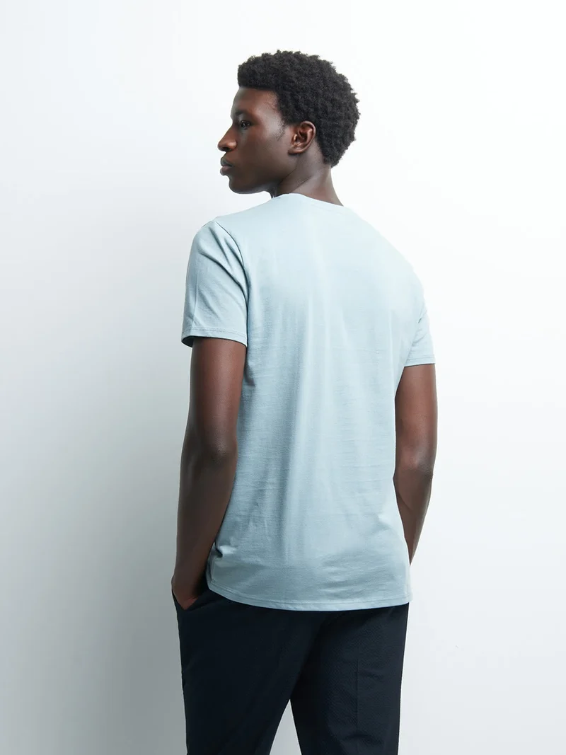 Tee-shirt en coton motif sur poitrine