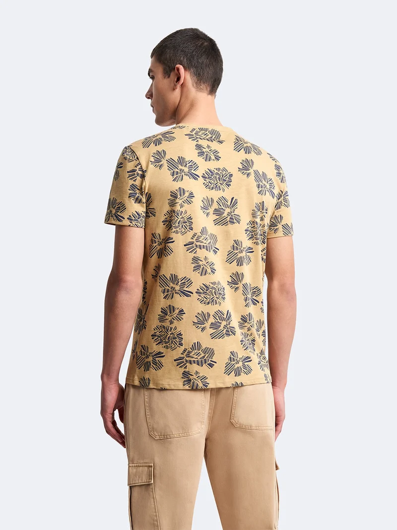 T-shirt col rond en coton fleuri