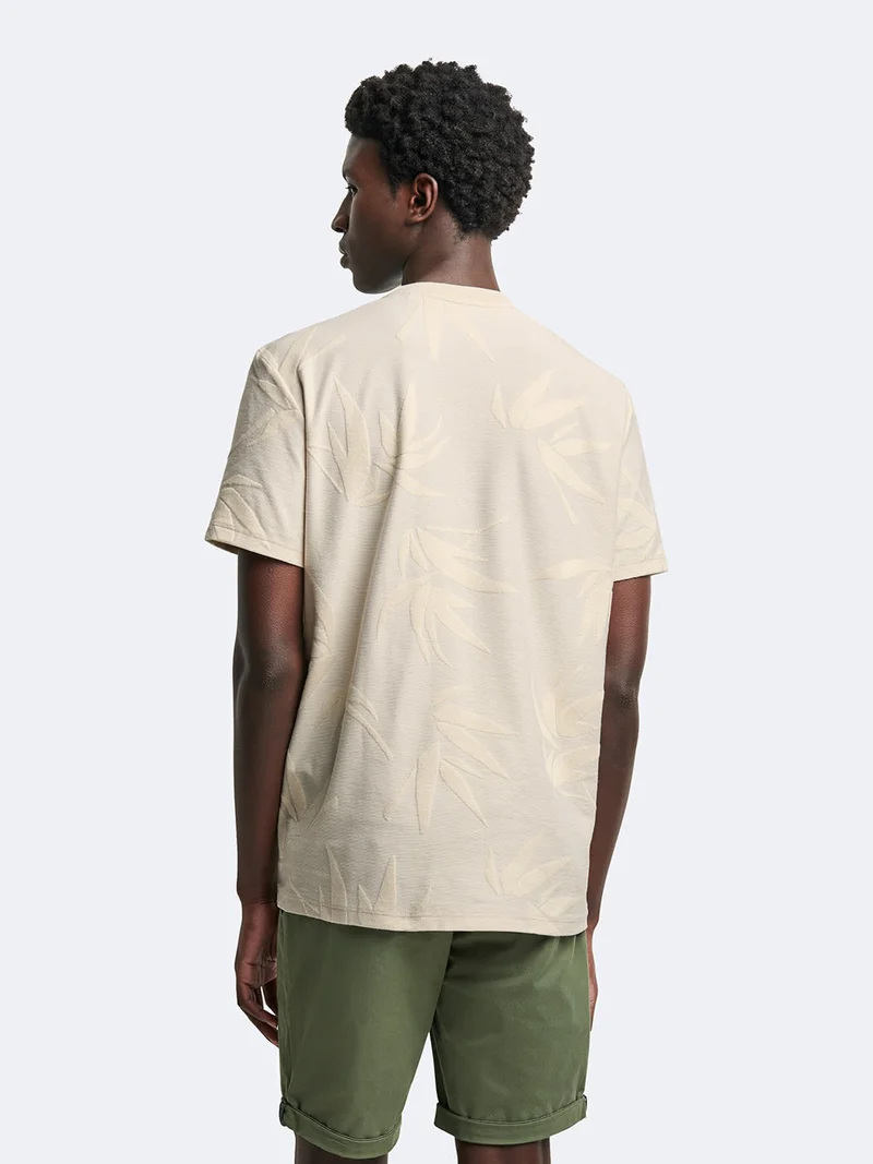 T-shirt col rond en coton fleuri