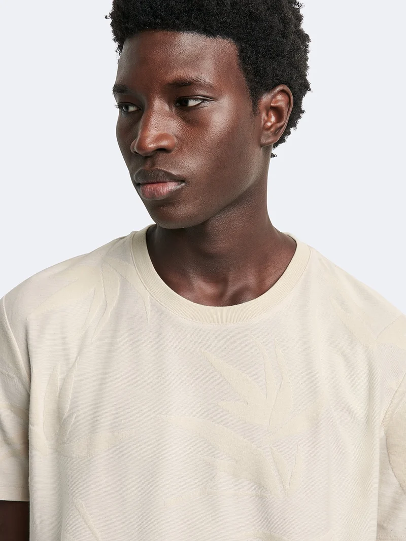 T-shirt col rond en coton fleuri