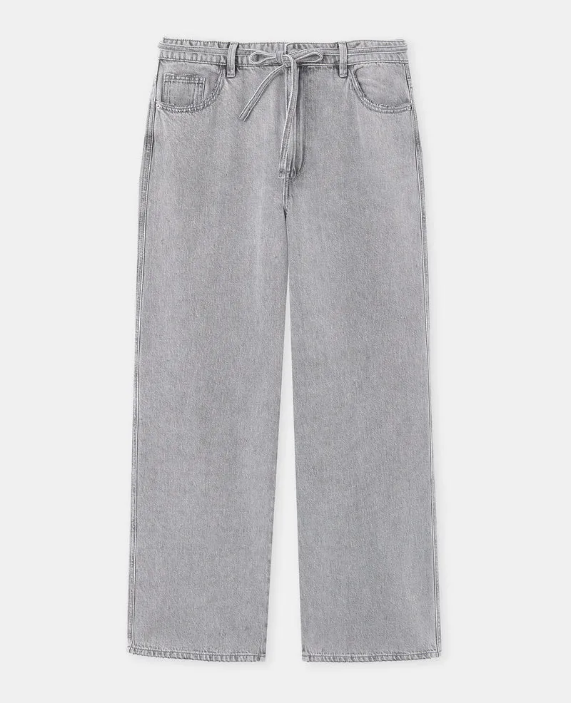 Jean baggy taille basse avec ceinture à nouer
