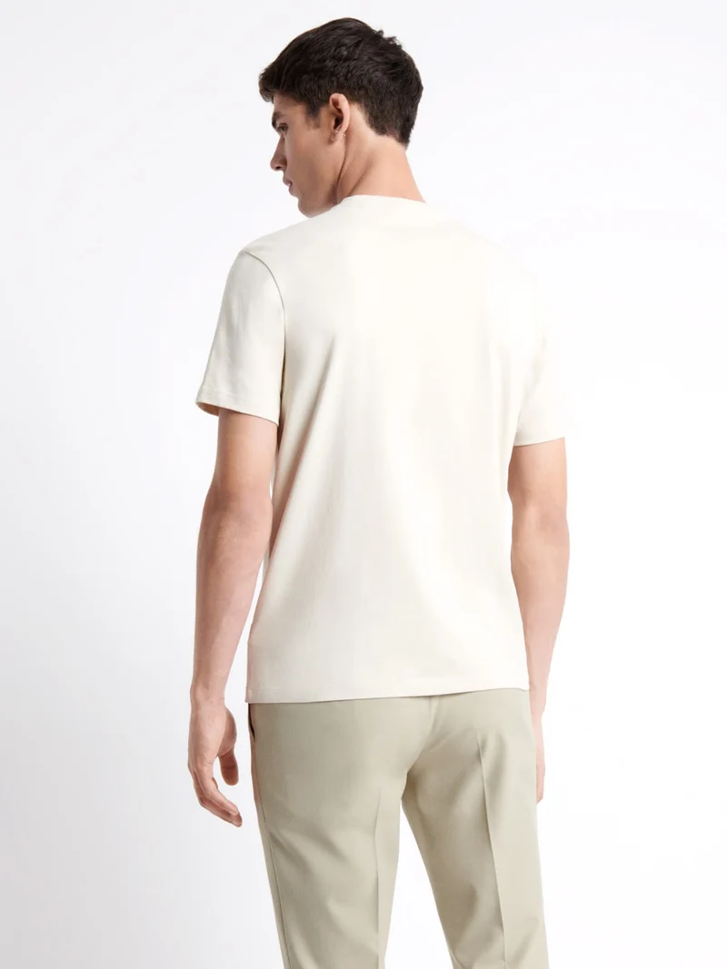T-shirt col rond en coton fleuri