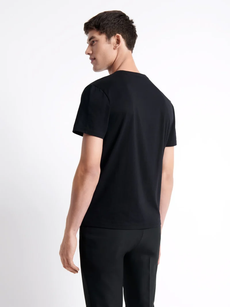 T-shirt col rond en coton fleuri