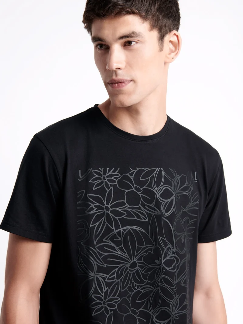 T-shirt col rond en coton fleuri