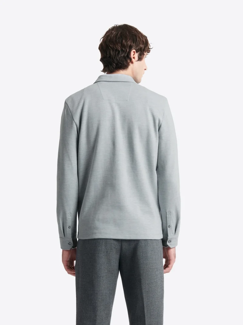 Polo manches longues chiné en coton