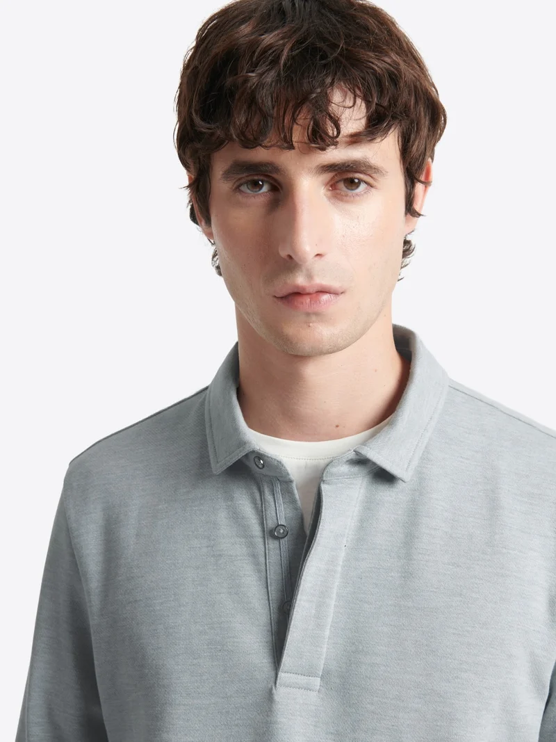 Polo manches longues chiné en coton