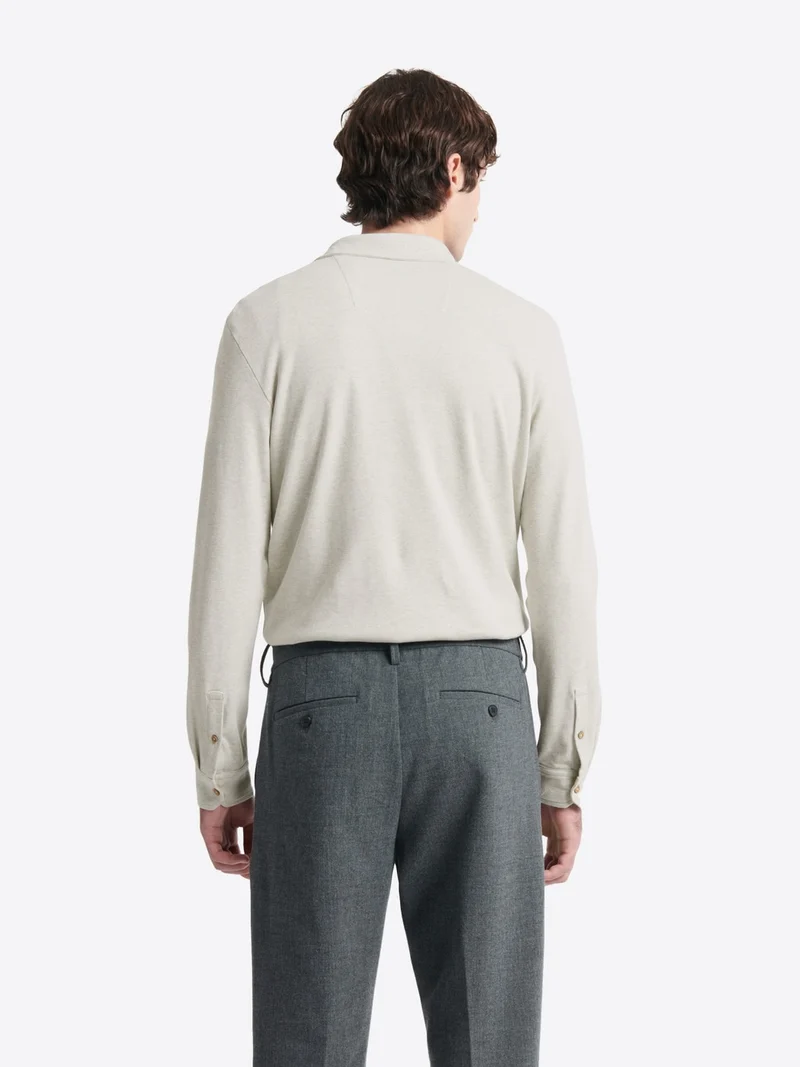 Polo manches longues chiné en coton