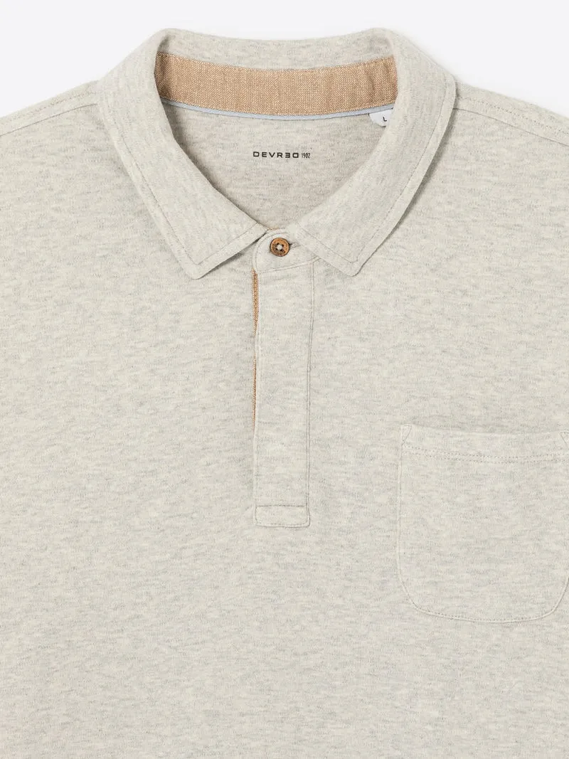 Polo manches longues chiné en coton