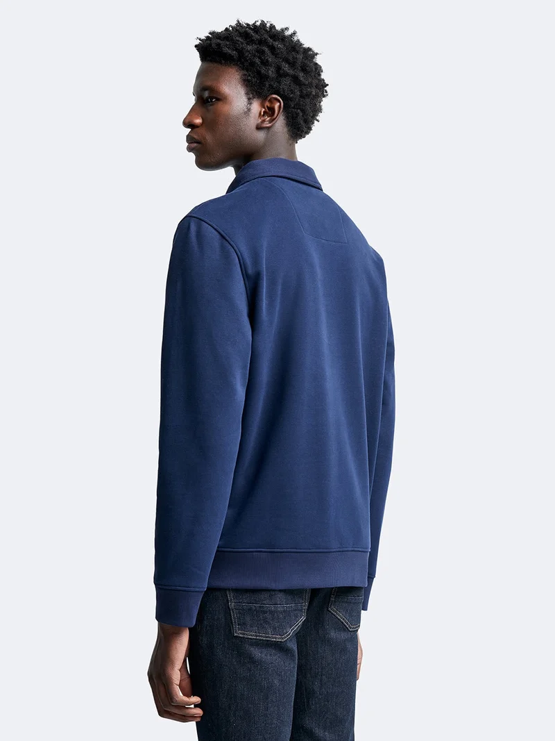 Polo manches longues en coton