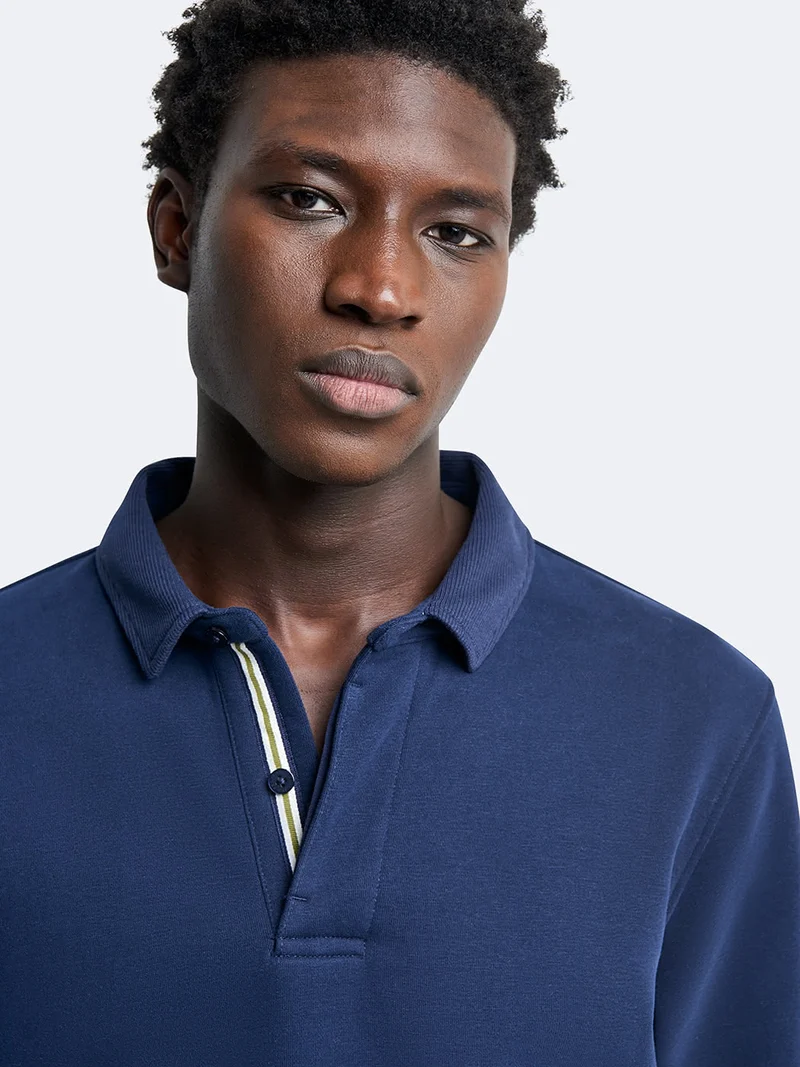 Polo manches longues en coton