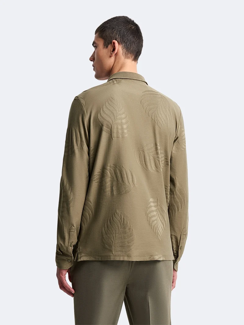 Polo manches longues en coton à motif