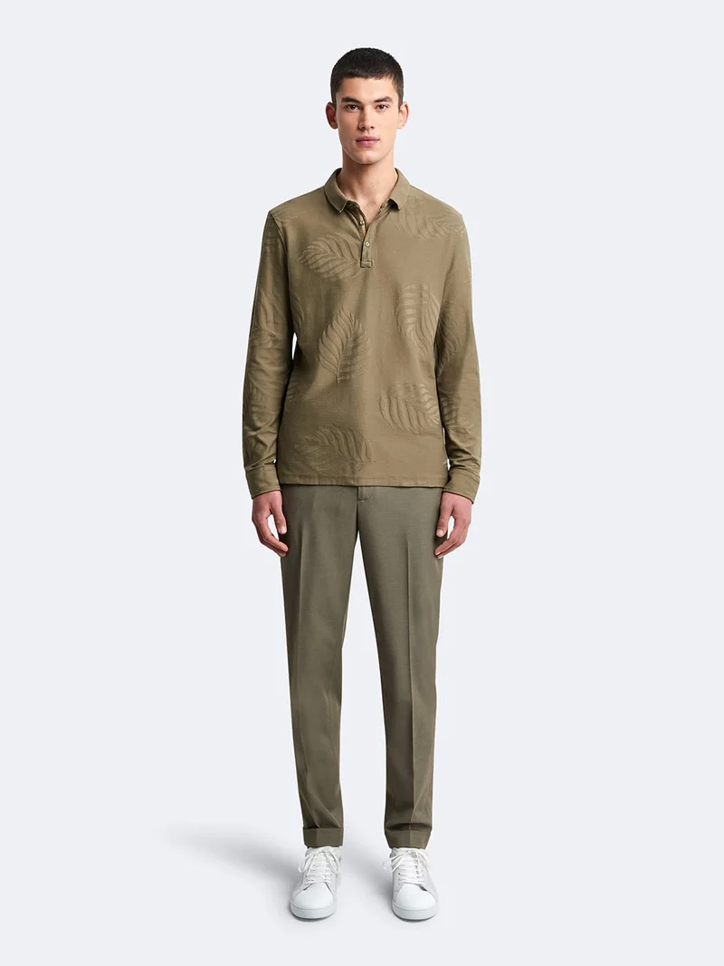 Polo manches longues en coton à motif