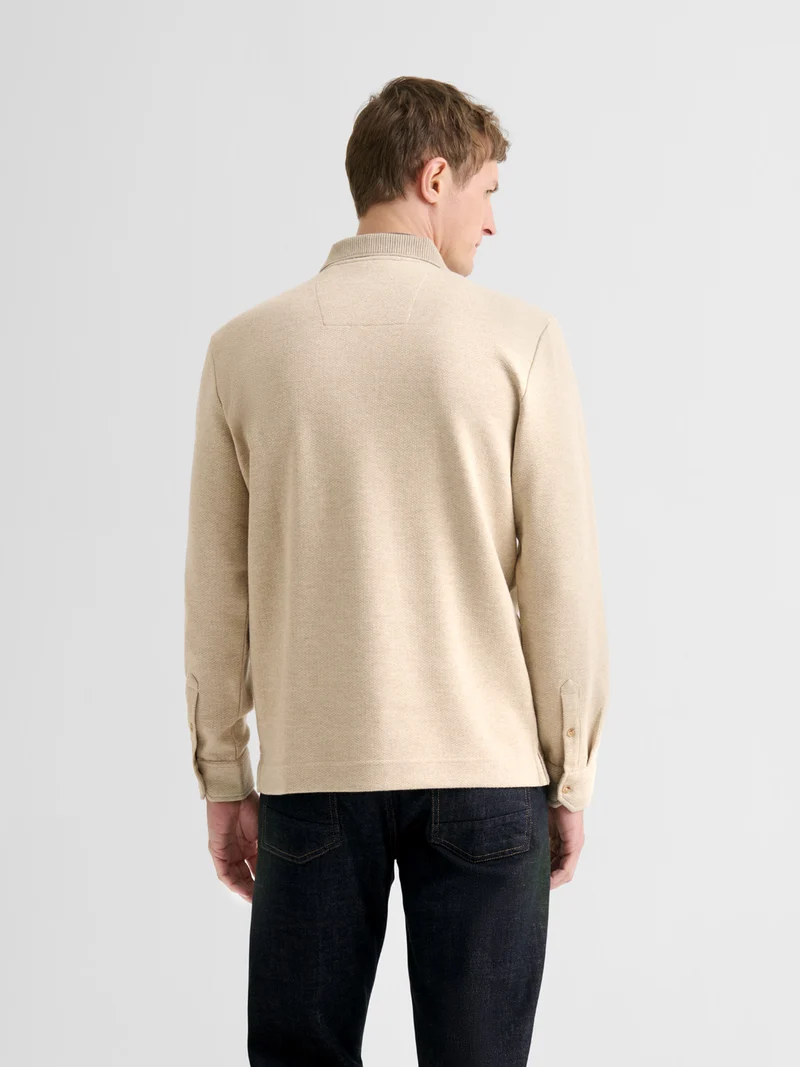 Polo boutonné en jacquard