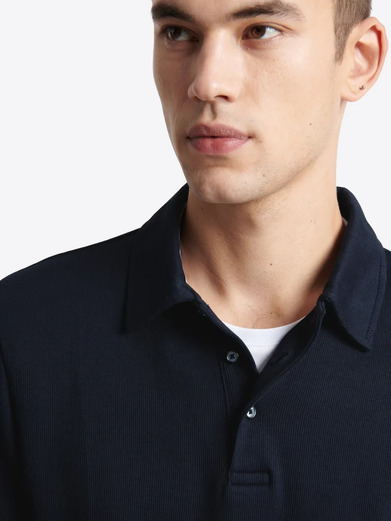 Polo manches longues en coton