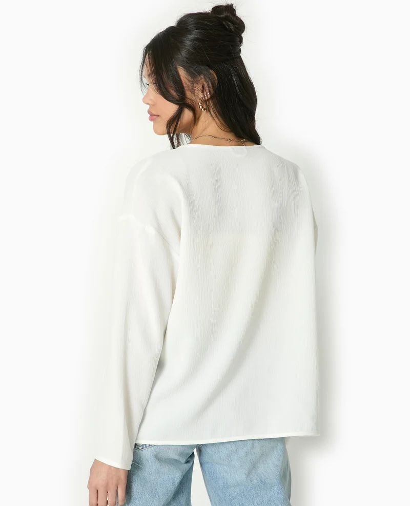 Veste légère et droite avec nouettes