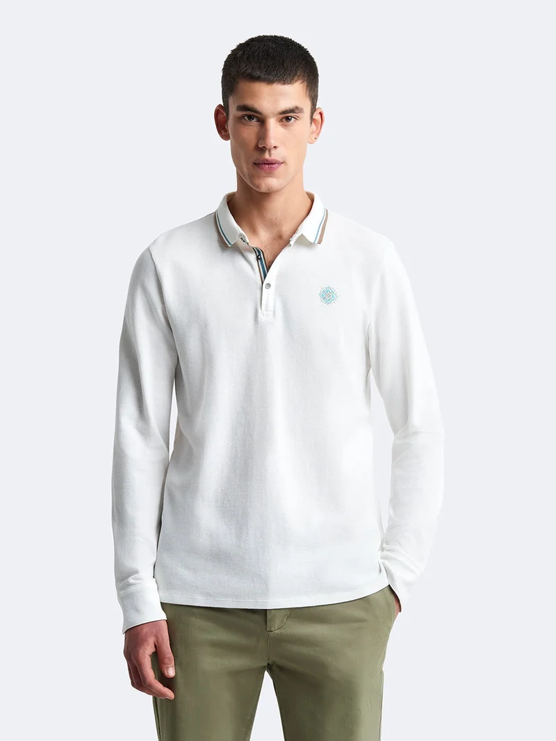 Polo manches longues en coton brodé