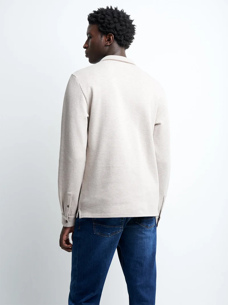 Polo manches longues en coton brodé