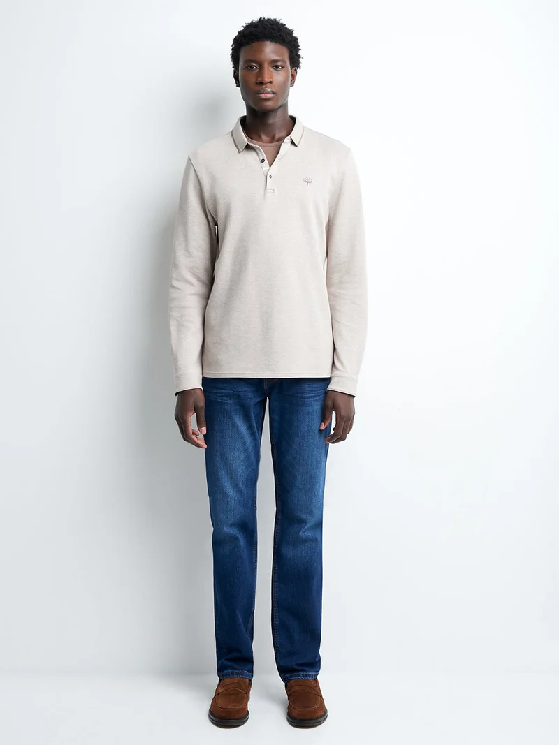 Polo manches longues en coton brodé