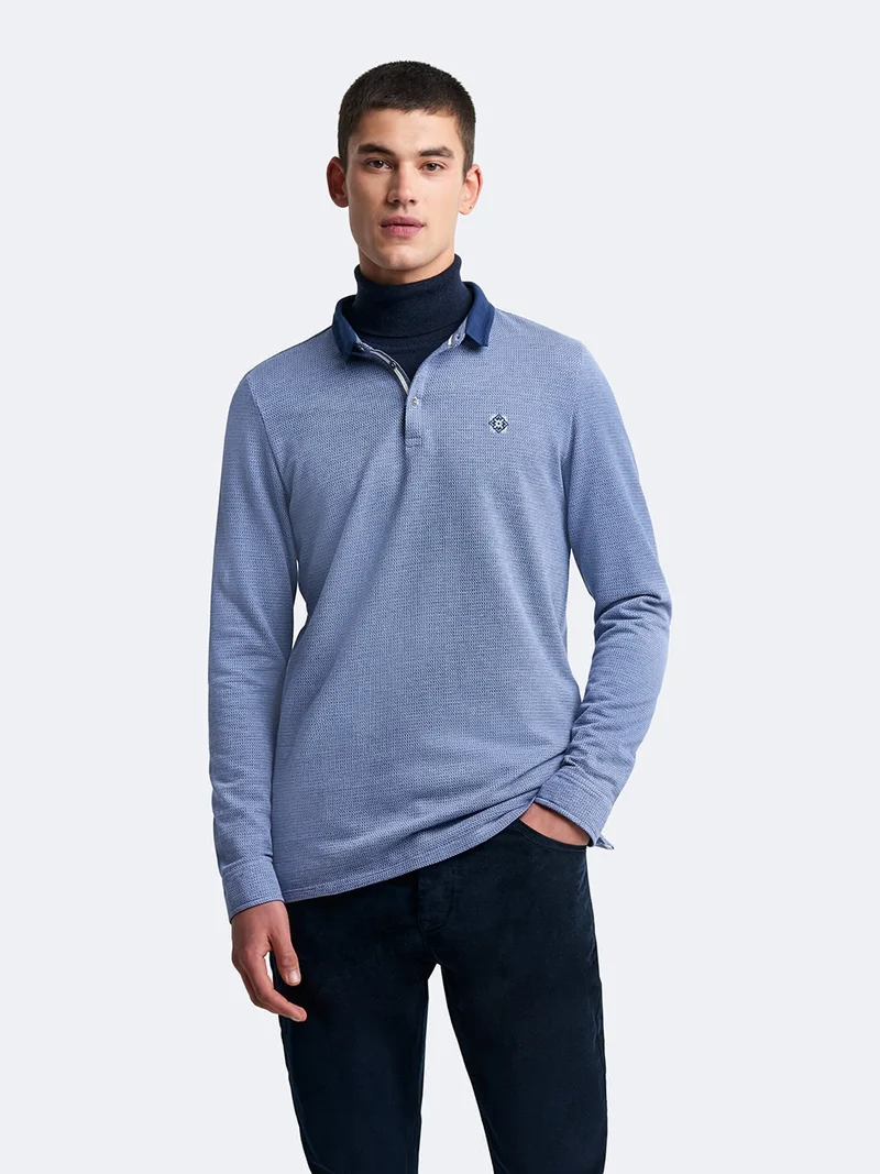 Polo manches longues en coton brodé