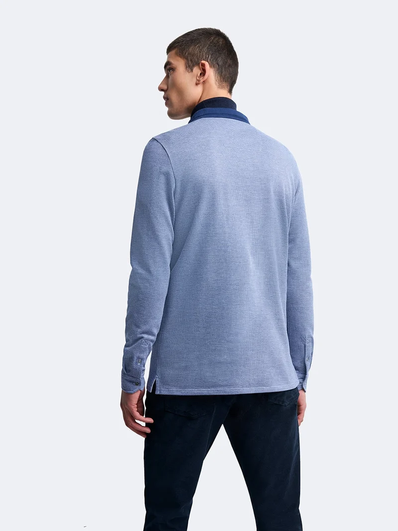 Polo manches longues en coton brodé