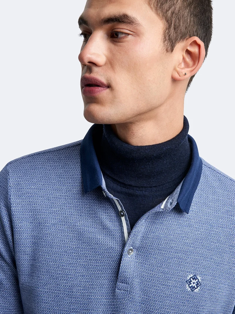 Polo manches longues en coton brodé