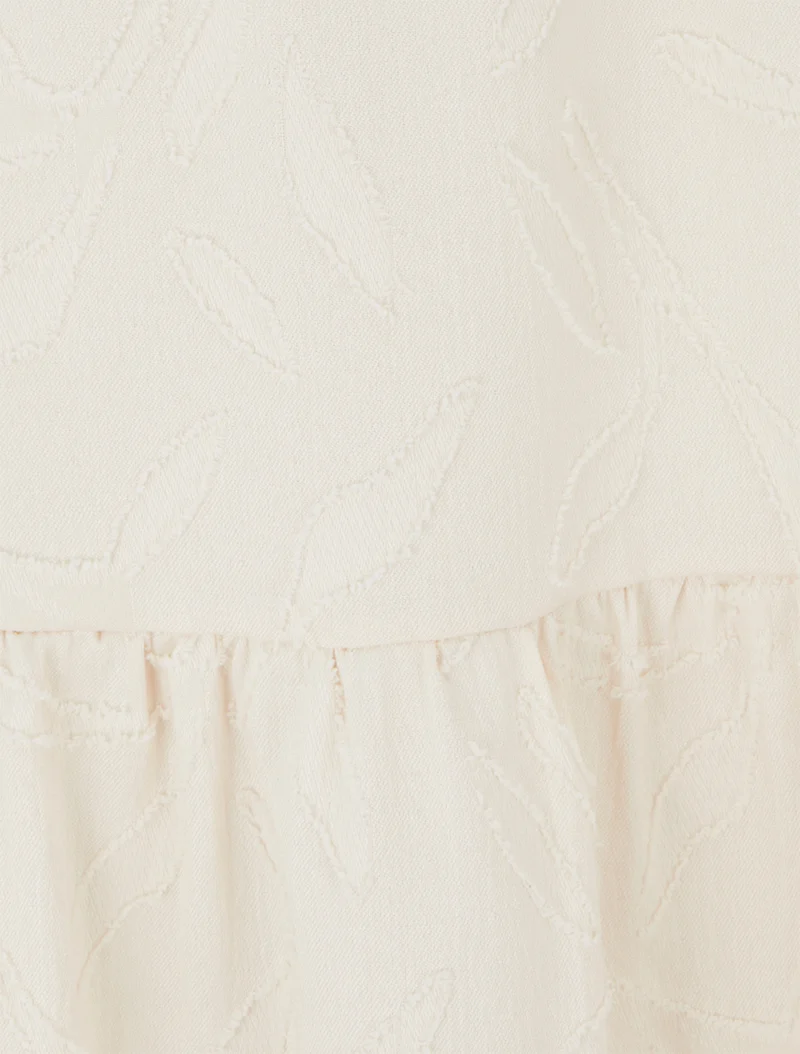 Jupe longue évasée en tissu texturé - Beige