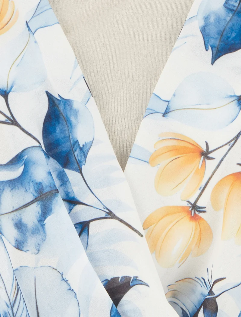 Top imprimé feuilles à manches volantées - Bleu