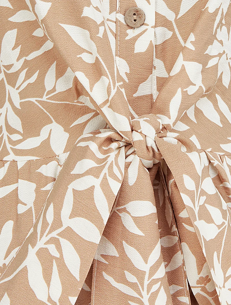 Robe fleurie sans manches à noeud - Beige