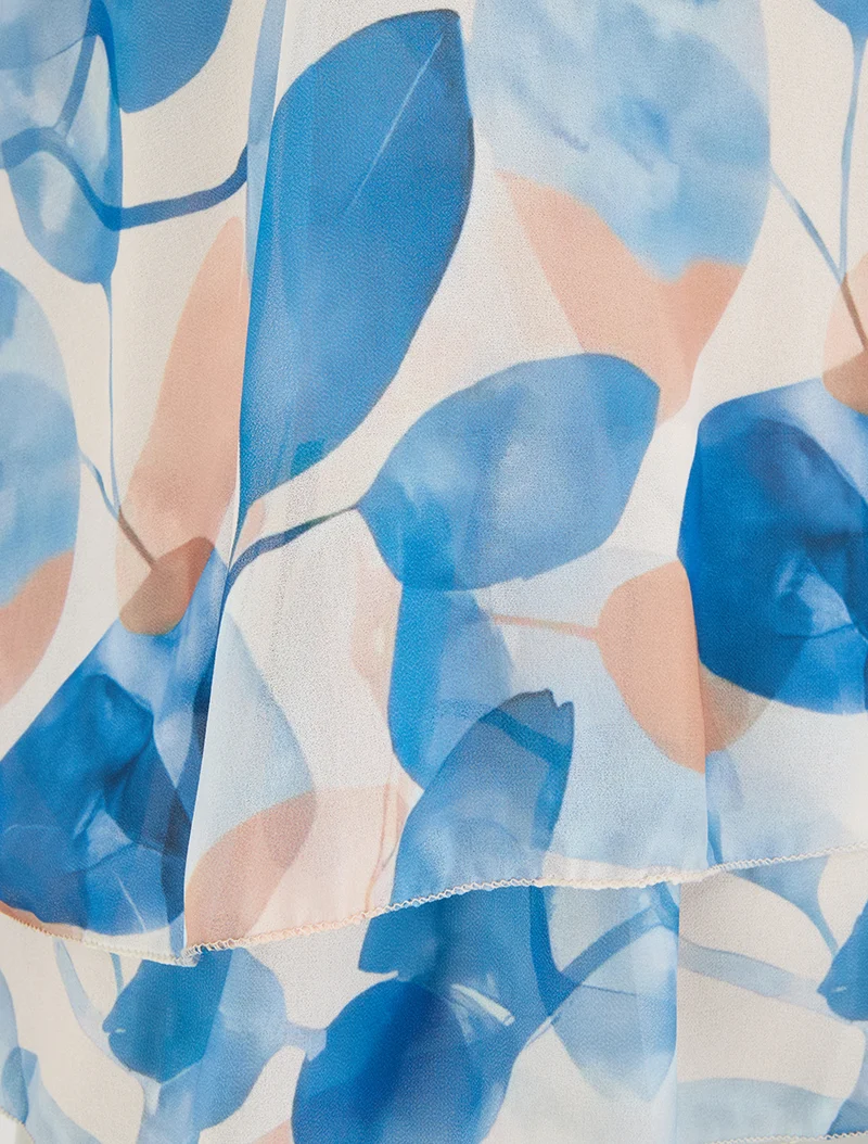 Top imprimé feuilles à bords volantés - Bleu